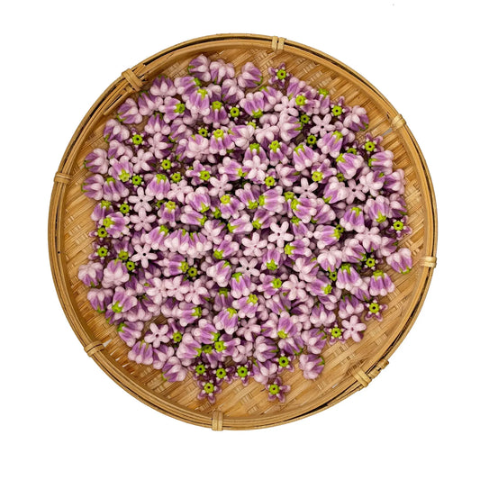 Purple and white handmade clay crown flower beads for Hawaiian leis and jewelry